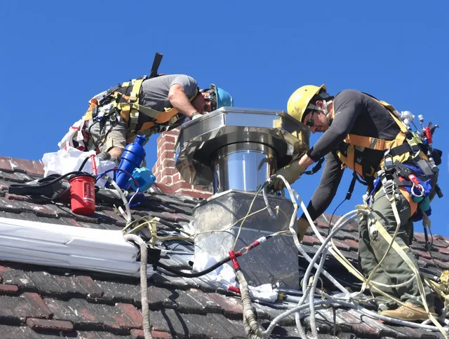 Protective chimney cap installed by Willimantic Chimney Sweep in Willimantic, CT