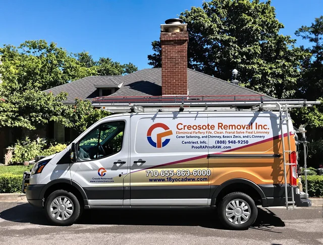 Willimantic Chimney Sweep technician removing creosote safely in Willimantic, CT