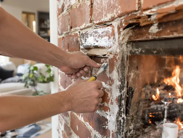 Routine fireplace repair by Willimantic Chimney Sweep in Willimantic, CT